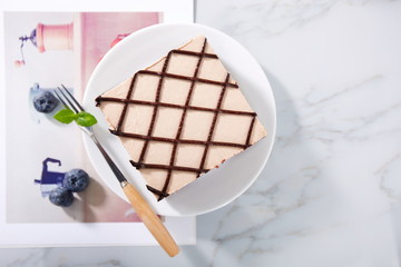 Homemade Coffee Mousse Cake on a white plate