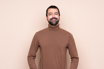 Man over isolated background laughing