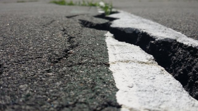Close-Up Of Cracked Road