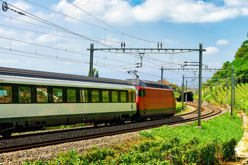 Running train on the railroad near Lavaux Vineyard Terraces hiking trail, Lavaux-Oron district,...