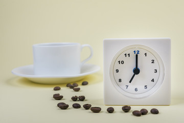 Fototapeta na wymiar Morning coffee, coffee cup time clock concept