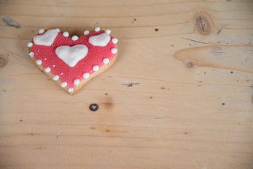 heart shaped gingerbread on a wooden table