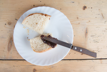 Homemade jam spread on a slice of bread