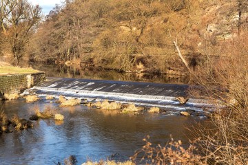 Small weir on river Svratka in Czech Republic - EU. Low water level. River basin.