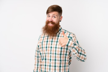 Redhead man with long beard over isolated white background giving a thumbs up gesture