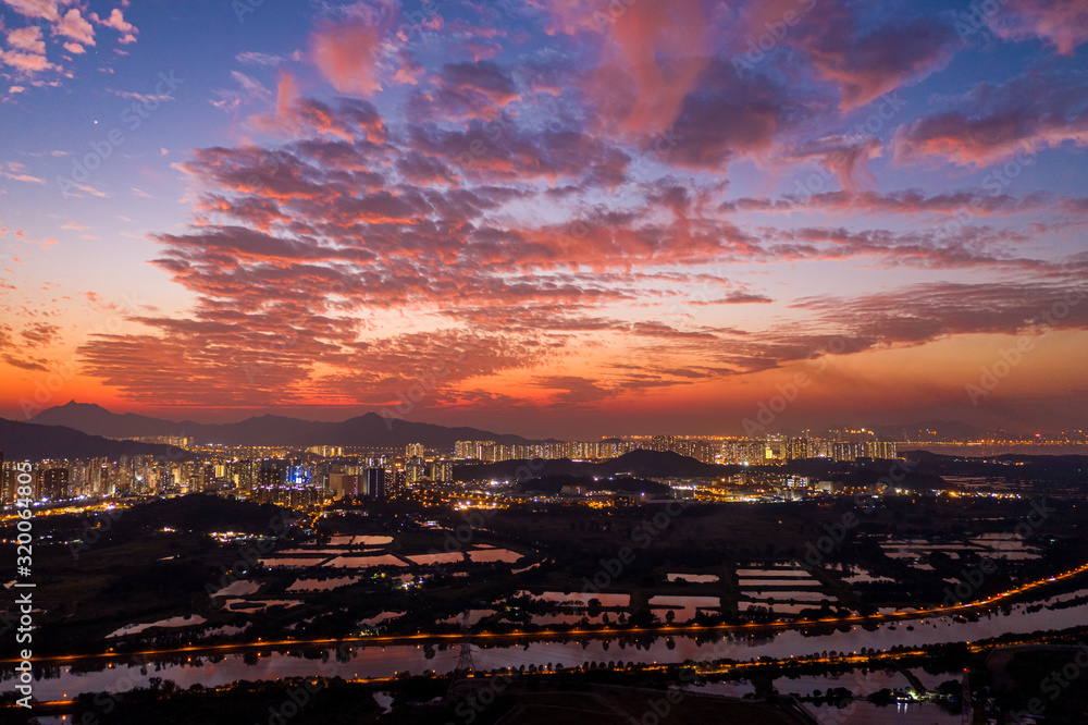 Poster Aerial View of rural green fields in Hong Kong border at sunset