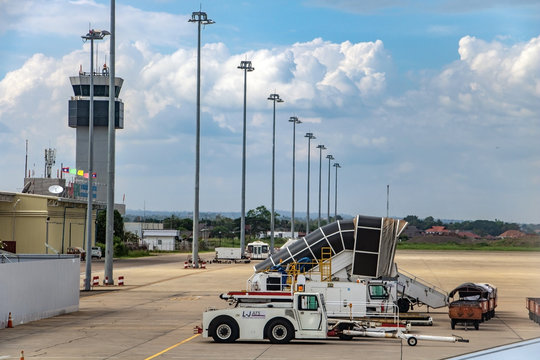 VIENTIANE, LAOS, OCT 30 2016, The control tower at The Wattay International Airport with vehicles, Vientiane, capital of Laos.