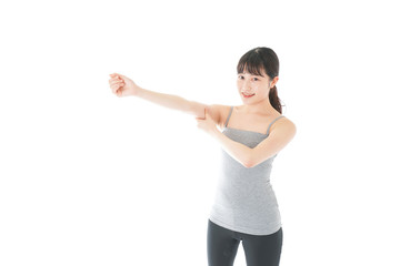 筋肉を鍛える若い女性