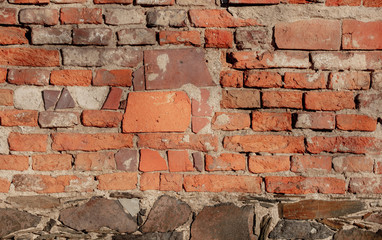 Closeup view on old brick wall of abandoned building