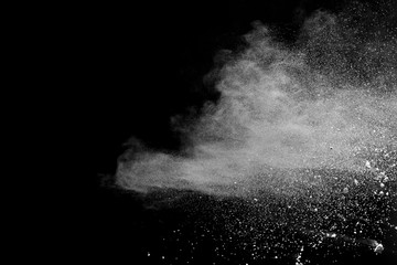 White powder explosion on black background. 