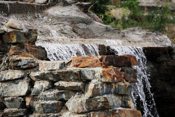old stone wall of stones