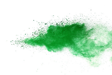 Green powder explosion on white background.