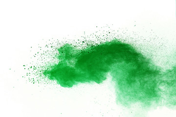 Green powder explosion on white background.