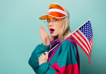 Beautiful woman in 90s sport suit in glasses with USA flag