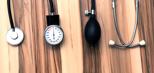 Cardiology. Tonometer and a manometer, stethoscope for diagnosis to measure of blood pressure and pulse.