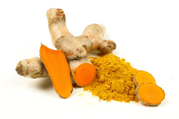 Turmeric powder (turmeric) and turmeric roots isolated on a white background are used as ingredients in turmeric foods. Turmeric helps to strengthen the skin.