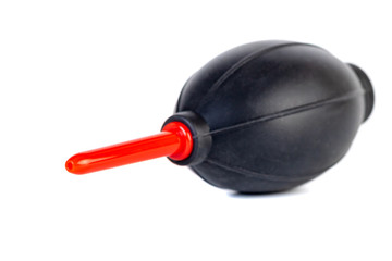 Pear for cleaning the camera from pollution on a white background.