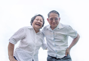 couple asian grandmother and grandmather smile from bottom view in happy emotion act on white background