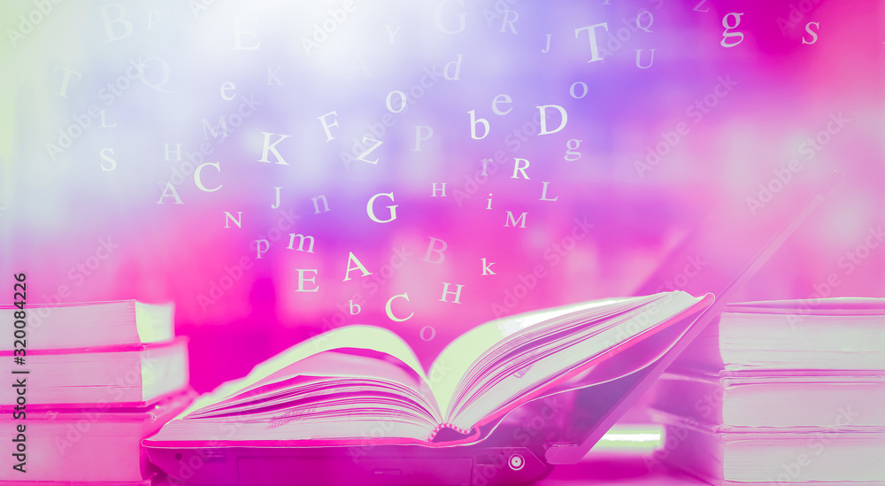 Poster open book on the table and english alphabet floating above the book in the library and blur bookshel