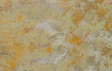 Abstract background of yellow orange textured strokes, splashes, drops of paint