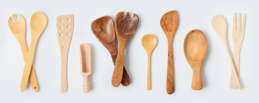 Wooden kitchen utensils collection on white background. Cooking or baking mock up for design.