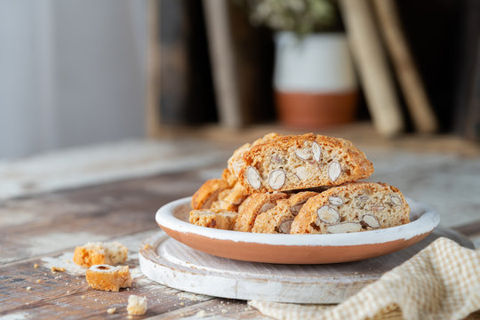 Carquinyolis, biscottis a typical pastry of Catalonia, Spain on rustic background with copy space.