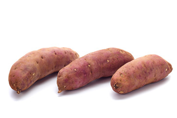 japanese sweet potatoes on white background