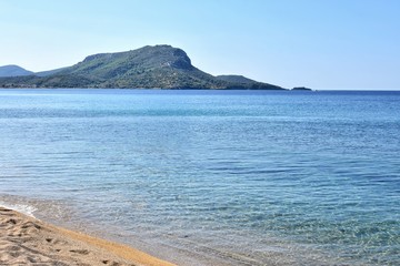 Seascape of amazing beach with blurred azure sea water in sunny day. Amazing natural beach with...