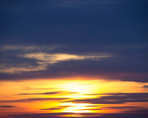 Clouds and sky lit by a winter sunset