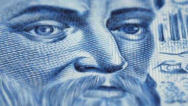 Pedro Alvares Cabral portrait on Brazil 10 real (2010) banknote rotating. Low angle, macro. 4K, 422 10 bit