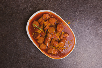 german currywurst - pieces of curried sausage