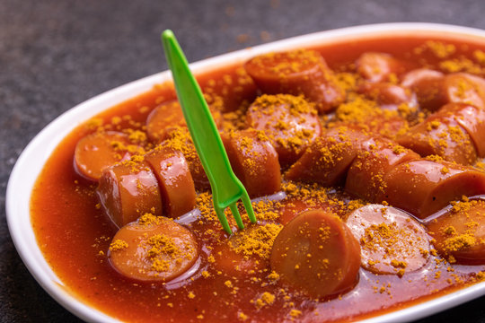 german currywurst - pieces of curried sausage