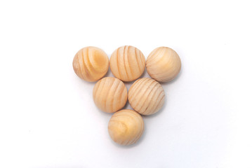 wooden striped globes on white background