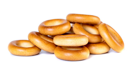 Small dry bagels, small rolls on a white background