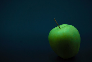 apple on green background