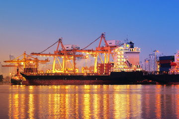 Fototapeta premium Container ship in export and import business and logistics.