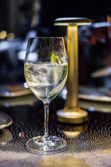 A glass of cocktail on the table