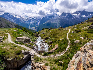 Walking from Kreuzboden to Saas Grund in the canton of Valais Switzerland