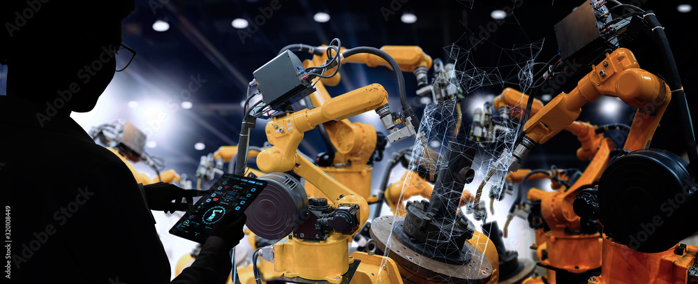 Poster Factory Female Industrial Engineer working with automation robot arms machine in intelligent factory industrial on real time monitoring system software.Digital future manufacture.