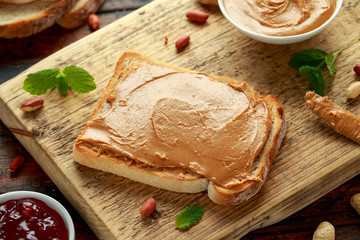 Peanut Butter Sandwich on wooden board. morning breakfast