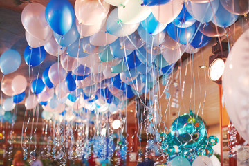 Celebration hall in restaurant decorated with balloons birthday party
