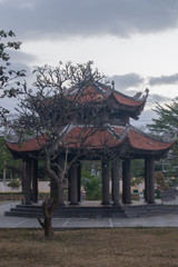 Fototapeta premium small Asian temple in the thickets of tropical plants