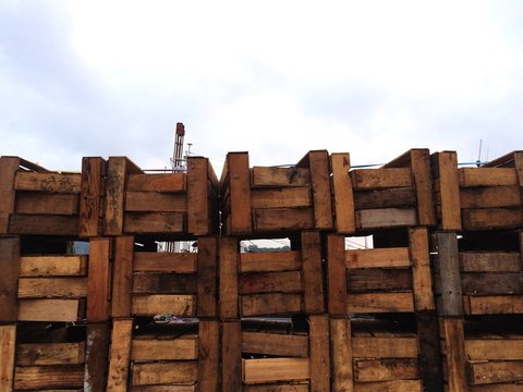 Stack Of Wooden Crate Boxes Outside Warehouse