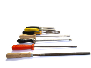 A set of different types of chisels and files.