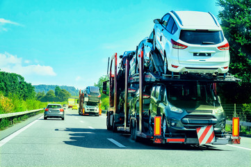Car transporter truck on the road, in Switzerland.