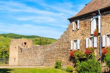 Beautiful typical stone house facade in picturesque Kientzheim village, Alsace wine region, France