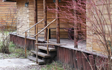 old wooden staircase to the house outside