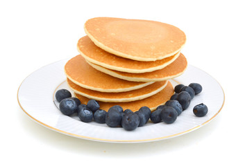 Pancake in plate on white