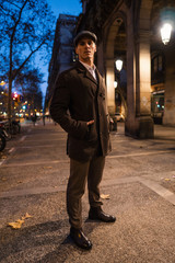 Old Fashion Man from the 1920s england walking along an old street of a historic city