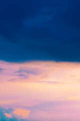 Dark stormy sky with the sun translucent